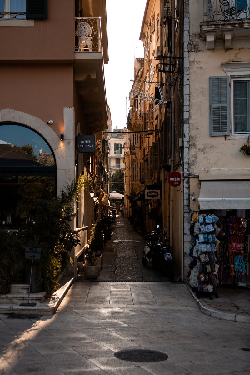 A narrow lane between historic buildings in Corfu Old Town